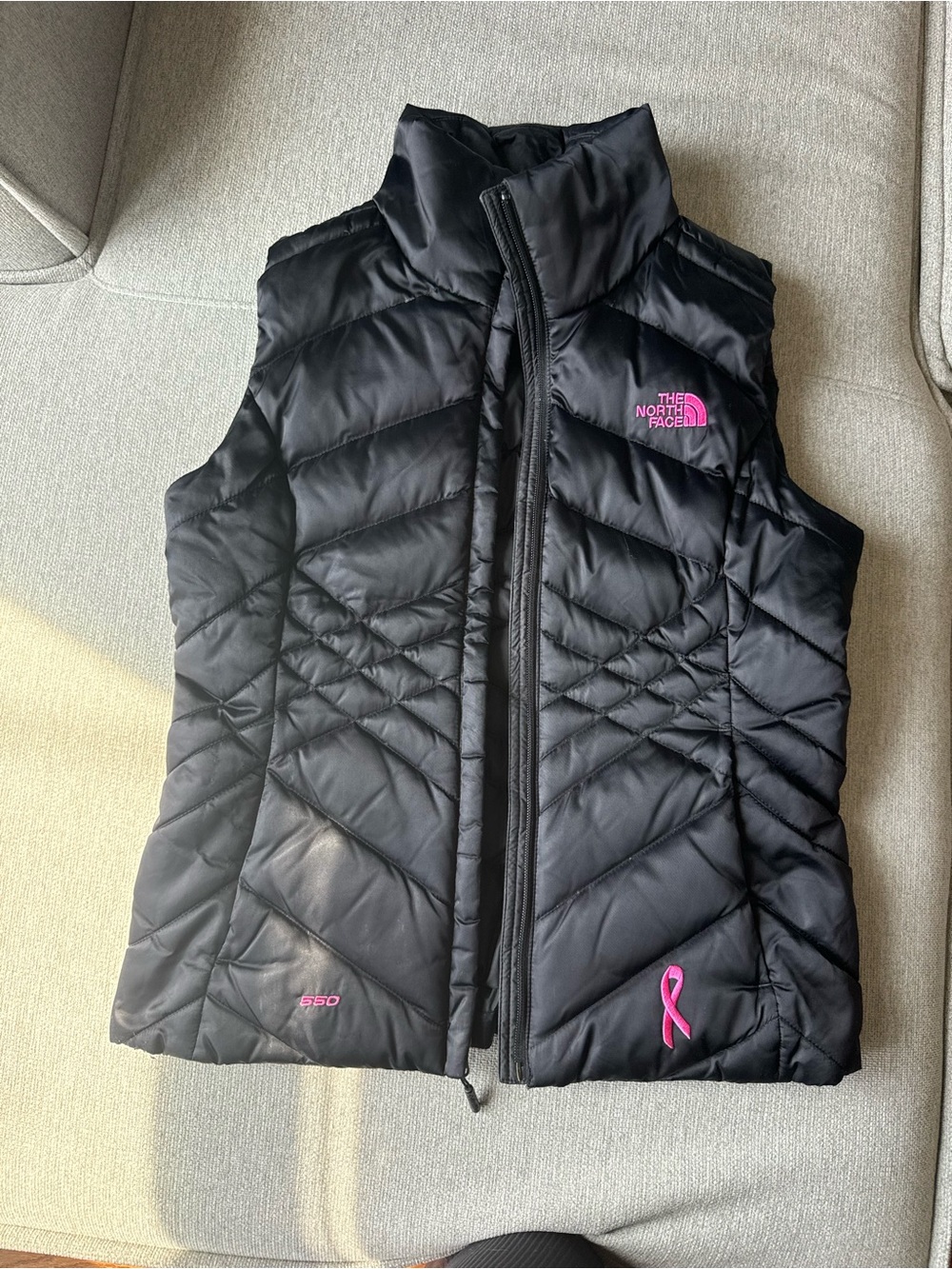 The North Face Black Women’s Insulated Vest with Pink Logo & Ribbon